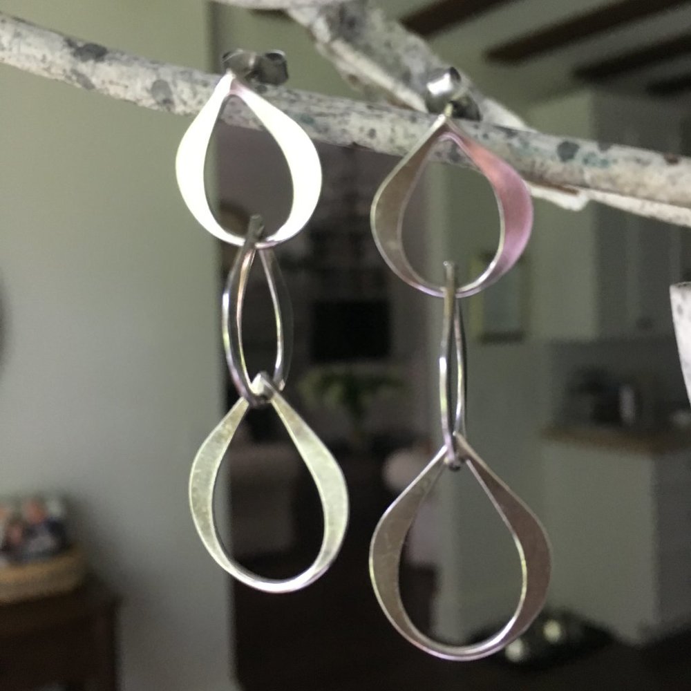 Handmade sterling interlocking teardrop dangle earrings.